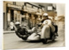 BMW sidecar outfit (number 5) passing through Onchan village by T.M. Badger