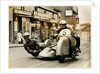 BMW sidecar outfit (number 5) passing through Onchan village by T.M. Badger