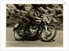 TT (Tourist Trophy) rider Cook from New Zealand aboard Moto Guzzi (number 47) by T.M. Badger