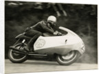 Bob Brown, TT (Tourist Trophy) rider, riding as number 25 by T.M. Badger