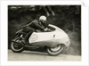 Bob Brown, TT (Tourist Trophy) rider, riding as number 25 by T.M. Badger