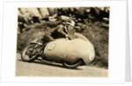 Bill Lomas TT (Tourist Trophy) rider aboard machine number 12 by T.M. Badger