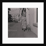 Blind woman and her guide dog by Manx Press Pictures