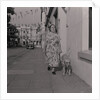Blind woman and her guide dog by Manx Press Pictures