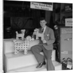 'Chap with Cigarette Packet Dogs' by Manx Press Pictures