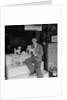'Chap with Cigarette Packet Dogs' by Manx Press Pictures