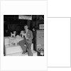'Chap with Cigarette Packet Dogs' by Manx Press Pictures