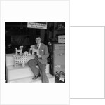 'Chap with Cigarette Packet Dogs' by Manx Press Pictures