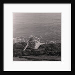 Mermaid on the rocks at Port Soderick by Manx Press Pictures