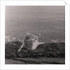Mermaid on the rocks at Port Soderick by Manx Press Pictures