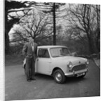 Geoff Duke receiving Mini Minor car by Manx Press Pictures