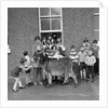 Donkey with children, Isle of Man by Manx Press Pictures