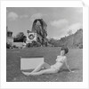 Woman in bikini advertising portable electric heater, Laxey Wheel by Manx Press Pictures
