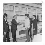 Geoff Duke at petrol station auto pay kiosk by Manx Press Pictures