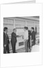 Geoff Duke at petrol station auto pay kiosk by Manx Press Pictures