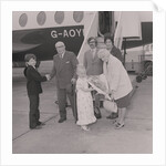 Visitors to the Isle of Man for 70 years arrive at Ronaldsway Airport by Manx Press Pictures