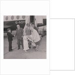 Visitors to the Isle of Man for 70 years arrive at Ronaldsway Airport by Manx Press Pictures