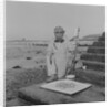 Metal detectorist on Douglas beach by Manx Press Pictures