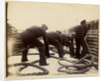 Sailors putting rope on a steamer by Anonymous