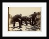 Sailors putting rope on a steamer by Anonymous