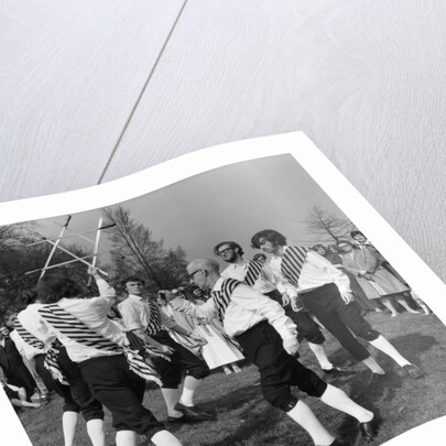Morris dancer performing during the may day festival by Staff