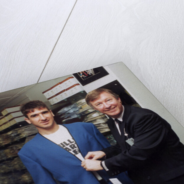 Alex Ferguson with Eric Cantona in a clothes shop by Holland