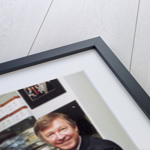 Alex Ferguson with Eric Cantona in a clothes shop by Holland