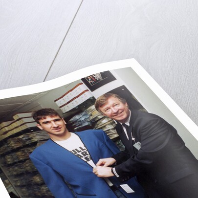 Alex Ferguson with Eric Cantona in a clothes shop by Holland