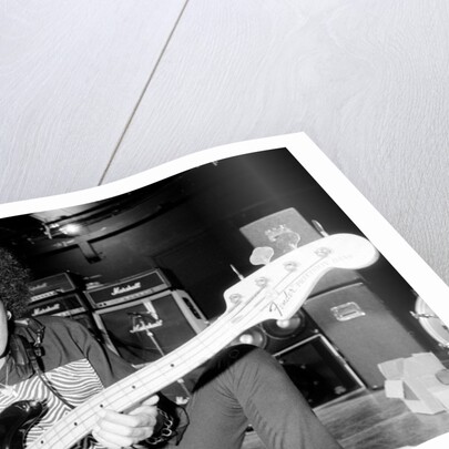 Phil Lynott of Thin Lizzy during a recording session for the groups new album. by Andy Hosie