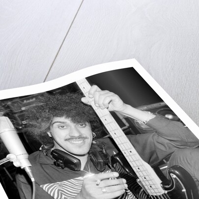 Phil Lynott of Thin Lizzy during a recording session for the groups new album. by Andy Hosie