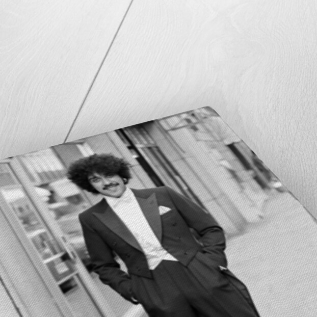 Phil Lynott in London, modelling clothes from Saville Row. 1983 by Mike Maloney