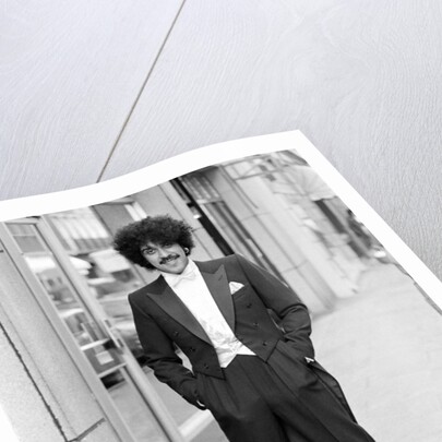 Phil Lynott in London, modelling clothes from Saville Row. 1983 by Mike Maloney