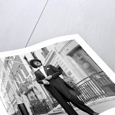 Phil Lynott in London, modelling clothes from Saville Row. 1983 by Mike Maloney