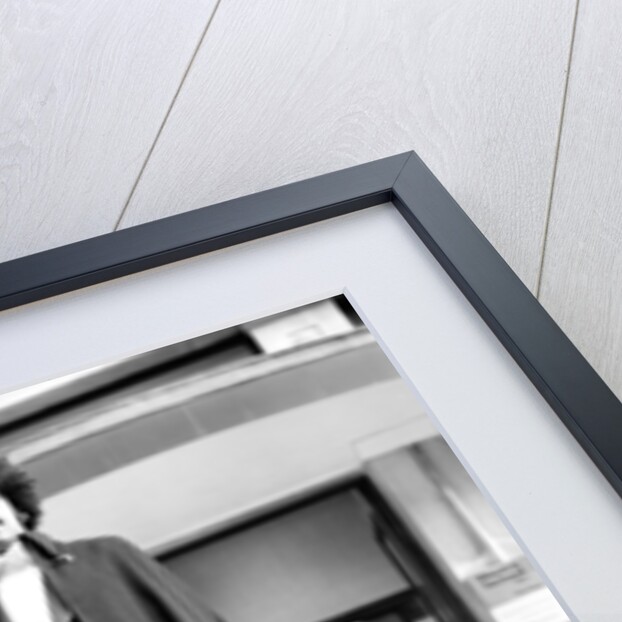 Phil Lynott in London, modelling clothes from Saville Row. 1983 by Mike Maloney