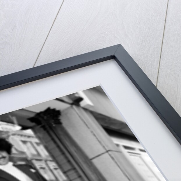 Phil Lynott in London, modelling clothes from Saville Row. 1983 by Mike Maloney