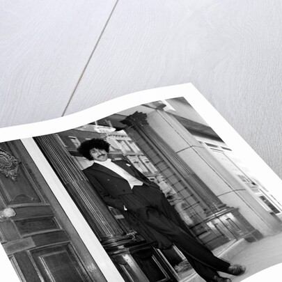 Phil Lynott in London, modelling clothes from Saville Row. 1983 by Mike Maloney