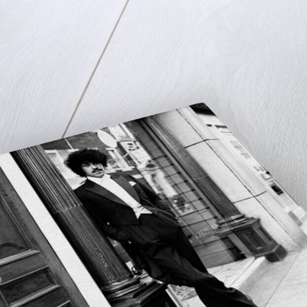 Phil Lynott in London, modelling clothes from Saville Row. 1983 by Maloney