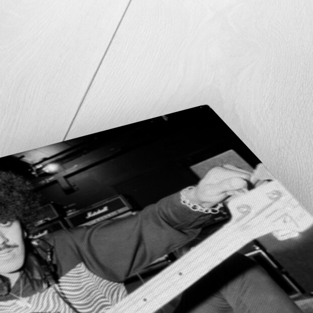 Phil Lynott of Thin Lizzy during a recording session for the groups new album. by Andy Hosie