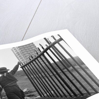 Young boy playing cowboys in Collyhurst by Dennis Hussey