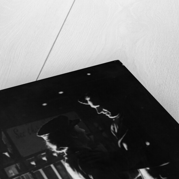 A young wartime couple say their goodbyes at the station as he returns to his army unit. 20th February 1944 by Staff