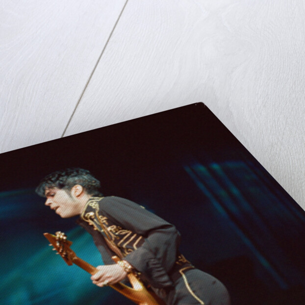 Prince performing on stage during his 'Ultimate Live Experience Tour' by Richard Nelmes