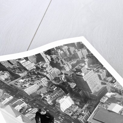 Workmen busy cleaning windows 1000 ft up the Empire State building by Daily Herald