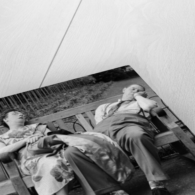 Old couple dozing in the sun at Serpentine Lido by Bob Hope