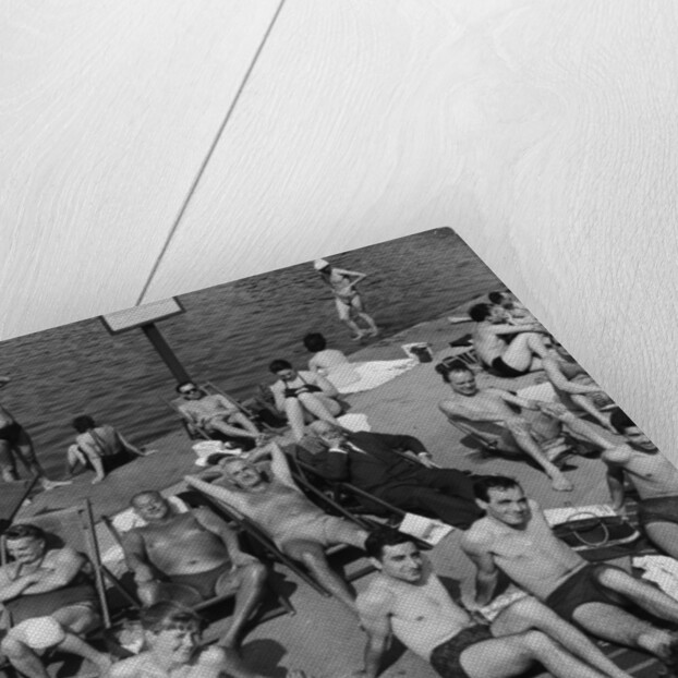 People sunbathing in a heatwave at the Serpentine Lido by Tommy Lea