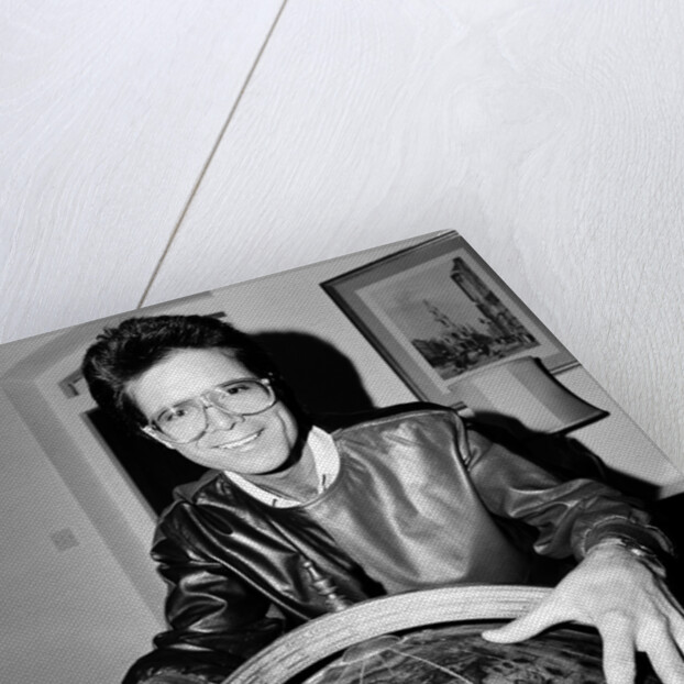 Cliff Richard with a globe by Anonymous