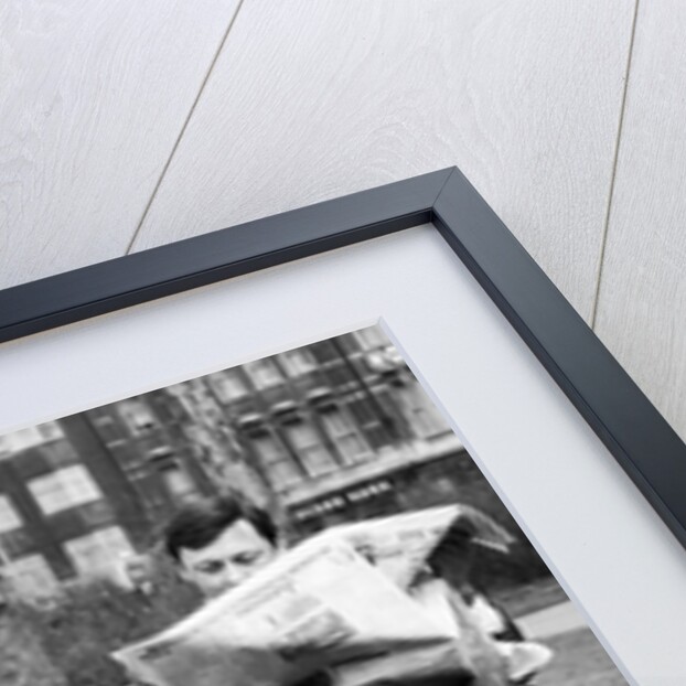 John reads on by Staff