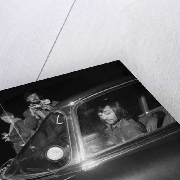 George Best arriving at Wilmslow station in his Jaguar to meet Carolyn Moore by Staff