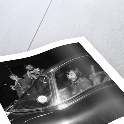 George Best arriving at Wilmslow station in his Jaguar to meet Carolyn Moore by Staff