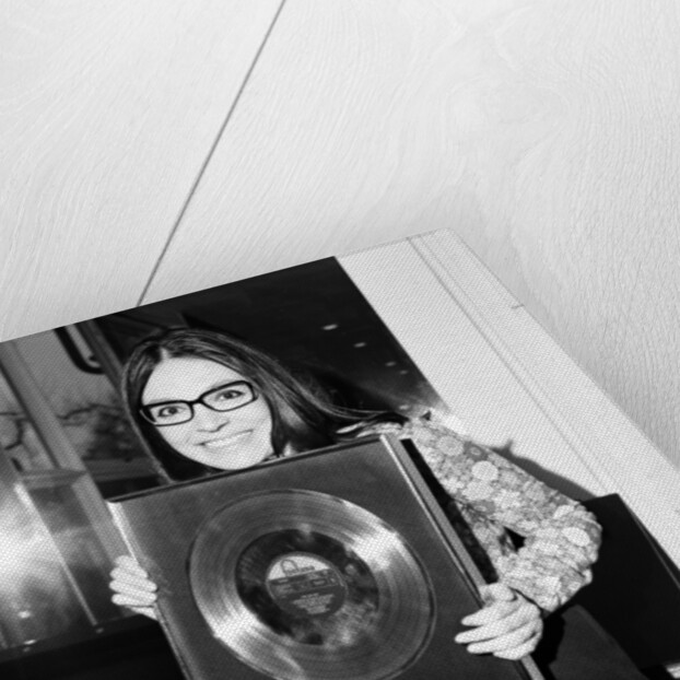 Nana Mouskouri presented with a gold disc by Maurice Kaye