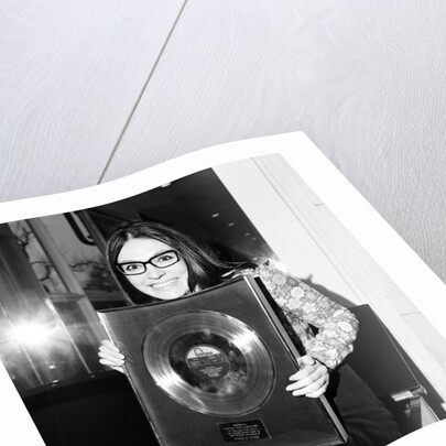 Nana Mouskouri presented with a gold disc by Maurice Kaye